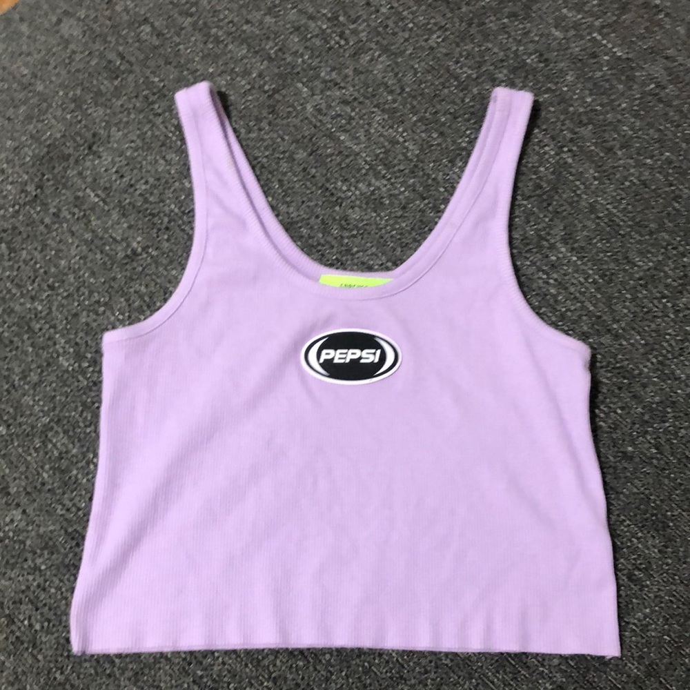 It’s a belly shirt. It’s been work a couple times has nothing on it.